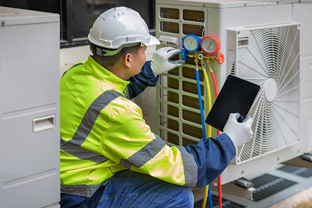 Professional Air Duct Cleaning technician working in Milledgeville, GA